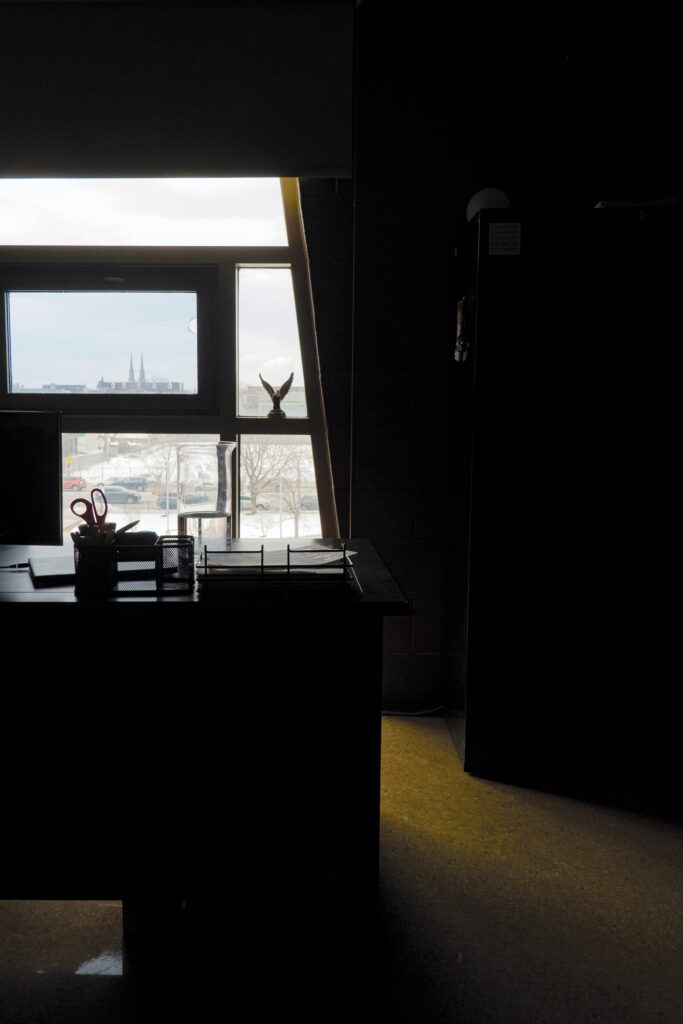 Interior view of a desk and window