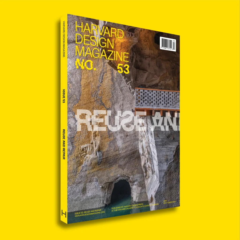 Magazine with a yellow spine, photograph of a stone wall with yellow and grey streaks and a brick structure in the middle coming from the right with text on top that says Harvard Design Magazine No. 53 and Reuse. All floating on a yellow background.