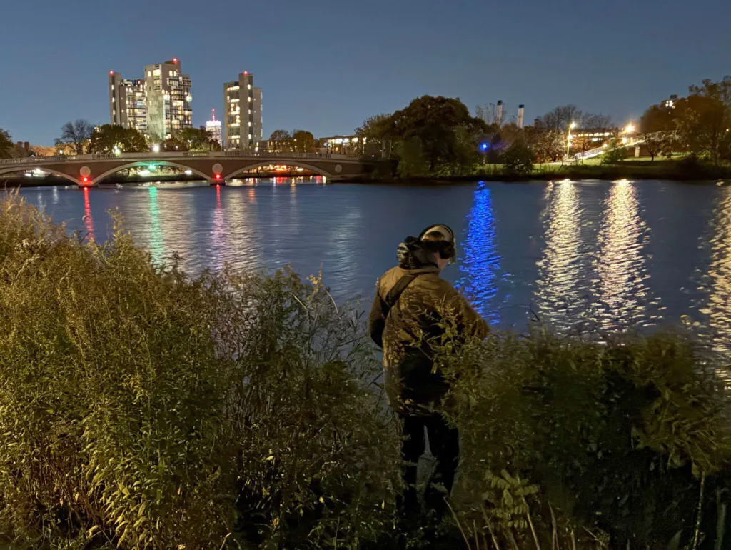 Jacek Smolicki records sound at the Charles River in Cambridge. 