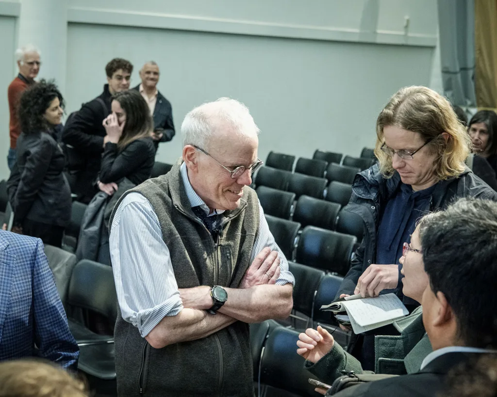 Bill McKibben speaks with people at the GSD. 