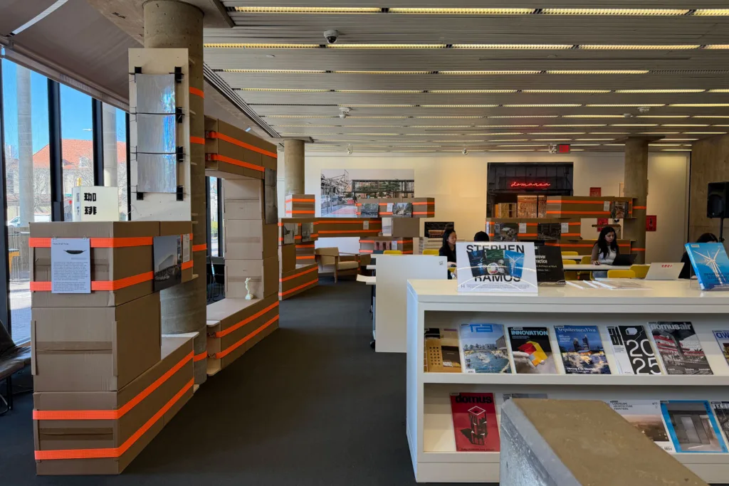 An interview view of the Frances Loeb Library with the exhibition "A temporal exhibition of temporary public spaces" installed. 