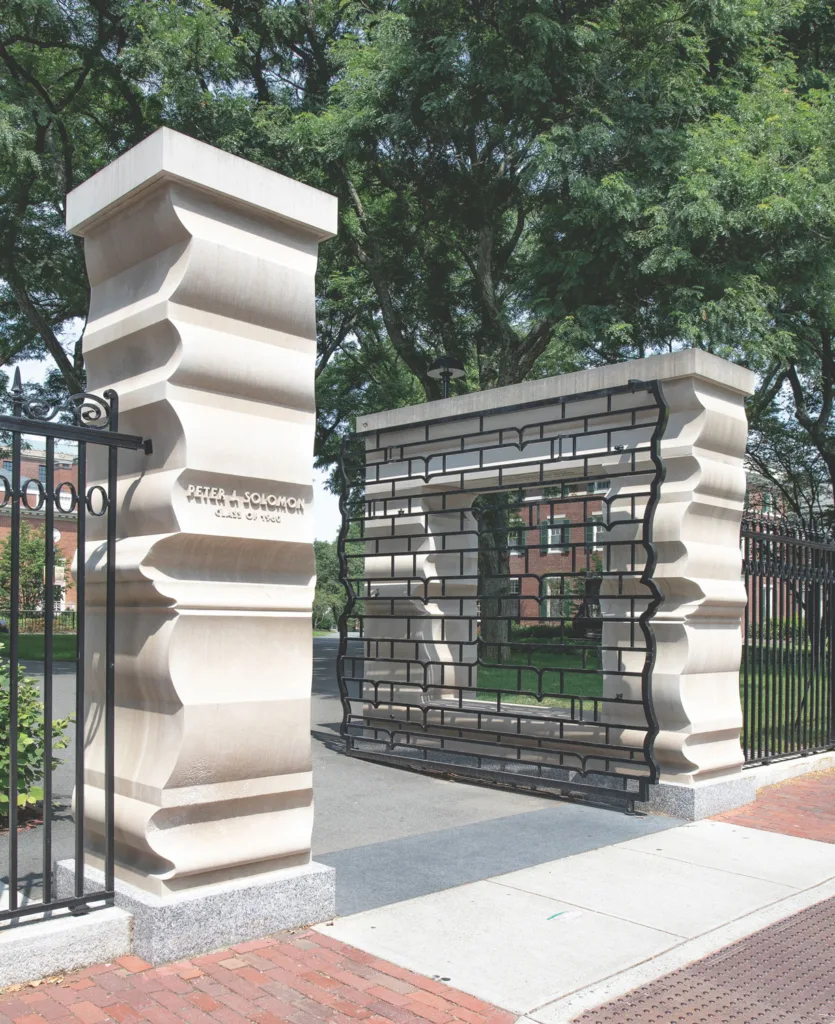 A photograph of the Peter J. Solomon Gate on Harvard Yard. 
