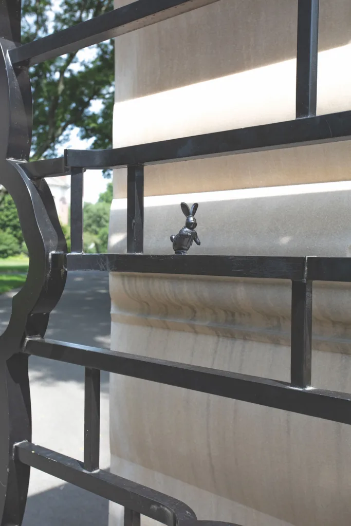 A small figure of a rabbit on the metal grate of the Solomon Gate. 