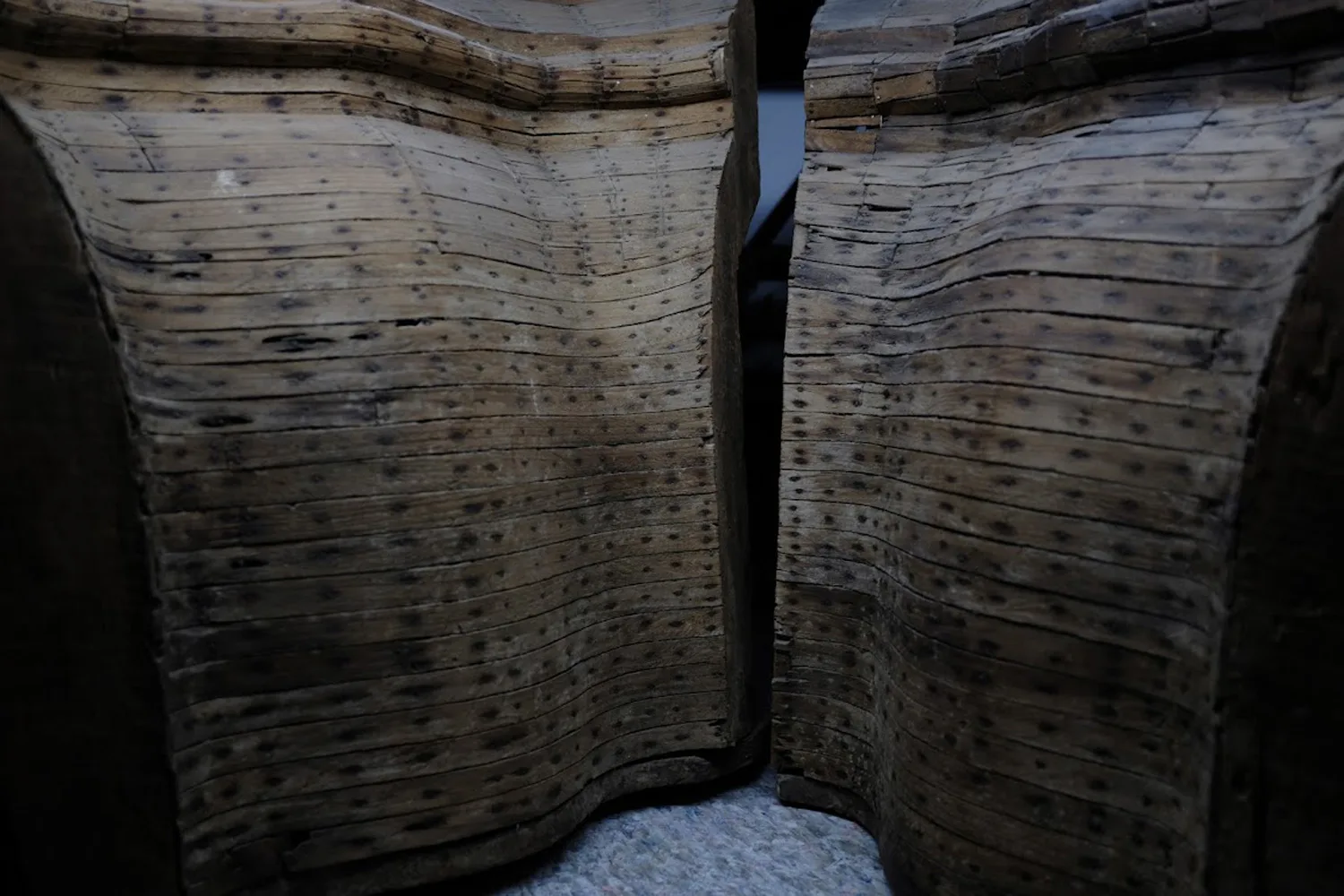 Detail of showing the many pieces of wood held in place by nails that comprise the mold.